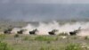 UKRAINE – Armoured Personnel Carriers (APC) ride during a military exercise in the training centre of Ukrainian Ground Forces near Rivne, May 26, 2021