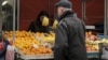 Bosnia and Herzegovina, Banja Luka, A shopper looks at groceries at the city market, December 23, 2024.