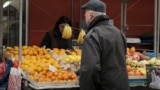 Bosnia and Herzegovina, Banja Luka, A shopper looks at groceries at the city market, December 23, 2024.