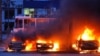 Vehicles blaze following a Russian strike on an industrial district of Zaporizhzhya, Ukraine, on January 8.