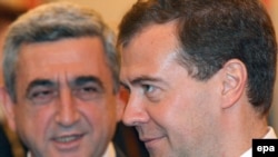 Medvedev and Sarkisian at a meeting in June