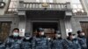 Armenia -- Riot police guard the entrance to the Office of the Prosecutor-General during an anti-government protest in Yerevan, January 28, 2021.