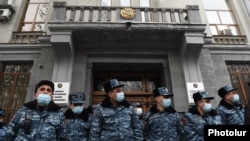 Armenia -- Riot police guard the entrance to the Office of the Prosecutor-General during an anti-government protest in Yerevan, January 28, 2021.