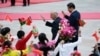 Afghanistan's President Ashraf Ghani and China's President Xi Jinping (R) wave to students during a welcoming ceremony outside the Great Hall of the People in Beijing. (File photo October 28, 2014)