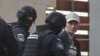 Fostul director adjunct al spionajului din R. Moldova, Alexandru Balan, adus la București de ofițerii Direcției de Investigare a Infracțiunilor de Criminalitate Organizată și Terorism