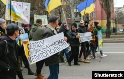 Акция протеста против вторжения России в Украину в захваченном российскими военными Мелитополе, 7 марта 2022 года