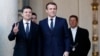 Președintele francez Emmanuel Macron (dreapta), întâmpinându-l pe omologul său ucrainean Volodimir Zelenski. 9 decembrie 2019