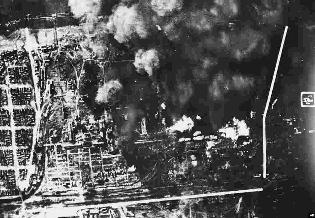 Clouds of smoke rise from besieged Stalingrad in this aerial picture that reached London and the United States via &quot;neutral sources.&quot; Despite repeated German bombings like this, the Russian city was still holding out. (White markings on the photo are not explained.) (AP)