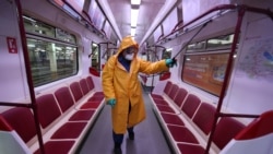 Disinfectant is sprayed to sanitize a subway train over coronavirus fears in Tbilisi.