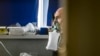 KOSOVO -- A Covid-19 patient sits with a respiration assisting equipment at the Clinic for Infectious Disease in Pristina, November 27, 2020