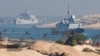 A French Navy carrier strike group and its escort transit the Suez Canal en route to the southern Red Sea.