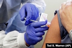 Испытание в Сиэттле вакцины от СOVID произведенной компанией Moderna