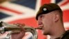 FILE: A bugler from the Royal Anglian Regiment plays members of the British Armed Forces take part in a service of commemoration taking place at the Afghan National Army Officers Academy (ANAOA) in Kabul.