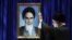 Iran -- Iran's Supreme Leader Ali Khamenei before a portrait of his predecessor Ayatollah Ruhollah Khomeini, undated.