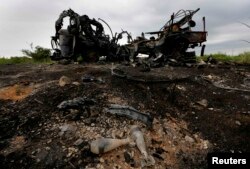 Vehicol militar distrus ieri lângă satul Oktiabrskoe.