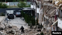 The aftermath of Russian drone and missile attacks in Kyiv on September 28.