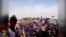 WATCH: Iraqi Refugees Clamor For Water Near Baghdad
