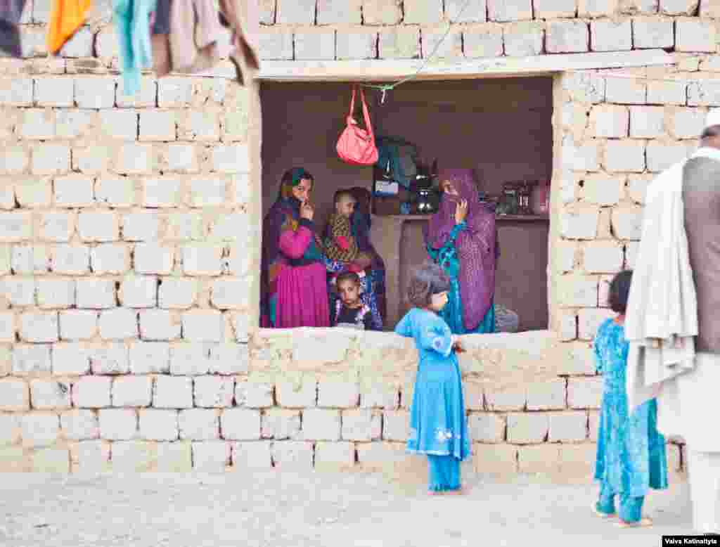 Latifa (left), a mother of five, was evicted from her home in Darra Adam Khel, a town in northwest Pakistan, where she had lived for nearly 20 years.&nbsp;