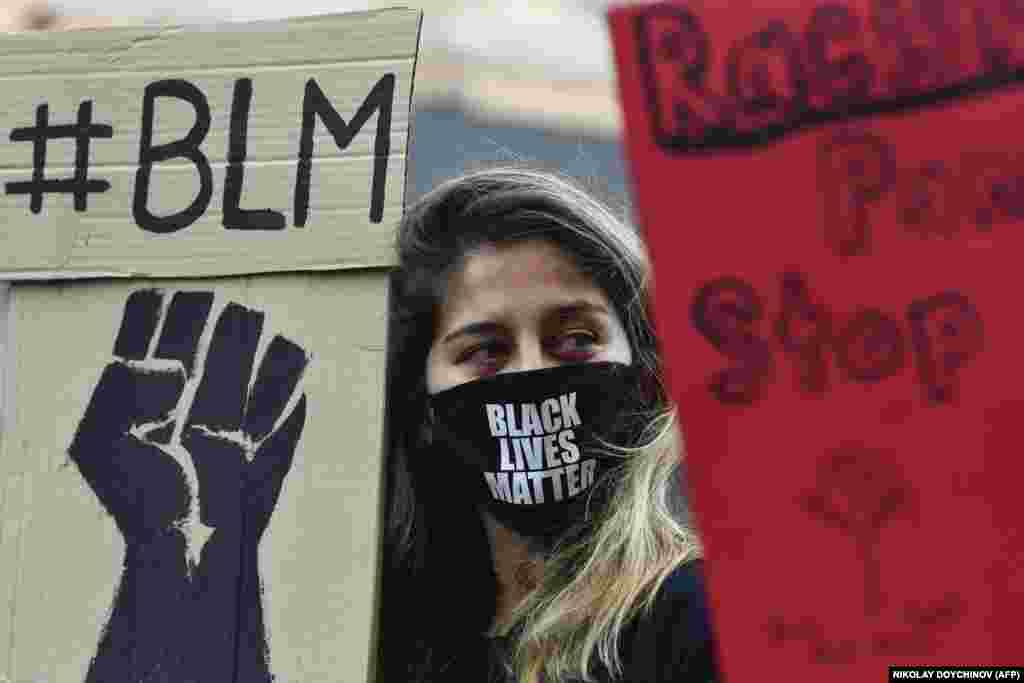 A protester wearing a face mask attends a rally in solidarity with the Black Lives Matter movement in the center of the Bulgarian capital, Sofia, on June 6. (AFP/Nikolay Doychinov)