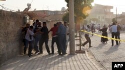 Взрыв в результате обстрела в городе Акчакал 3 октября 2012