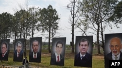 Yslamabat. YHG sammitine gatnaşýan liderleriň portretleri
