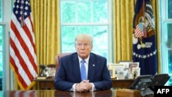 US President Donald Trump speaks during a meeting with advisors about fentanyl in the Oval Office of the White House in Washington, DC on June 25, 2019.