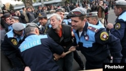 Armenia -- Riot police detain activist Shant Harutyunyan in downtown Yerevan, 5 November, 2013