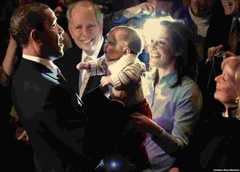 The president greets a supporter and her baby in Alexandria, Virginia, on March 30, 2010, shortly after he signed the Health Care and Education Reconciliation Act, enabling the Affordable Care Act to go into effect. The Affordable Care Act, widely known as Obamacare, expanded access to health care to an estimated 20 million previously uninsured people.