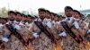 FILE: Members of Iran's Islamic Revolutionary Guards Corps (IRGC) march during the annual military parade marking the anniversary of the outbreak of the devastating 1980-1988 war with Saddam Hussein's Iraq, in Tehran, September 2018.