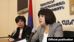 Armenia - Deputy Economy Minister Karine Minasian (R) at a news conference in Yerevan.