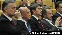 Predsjednici SDP i SDA Zlatko Lagumdžija i Sulejman Tihić, te funkcioneri tih stranaka Željko Komšić i Bakir Izetbegović, 2011.