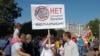 'We're Belarusians, Not A Russian Region': Protests Take Aim At Kremlin