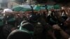 The funeral of Saeed Attallah, a leader in Hamas's armed wing, is held on October 5 in the northern Lebanese city of Tripoli after he and his family were killed in an Israeli strike. 