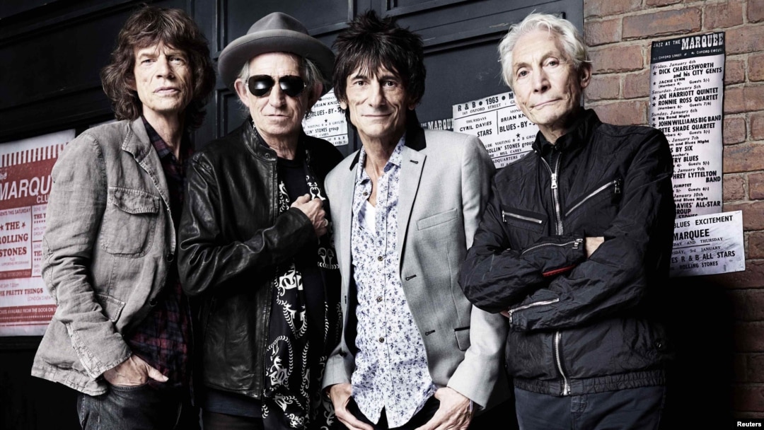 The Rolling Stones pose in front of the Marquee Club in London on July 11, 2012.