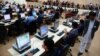 Afghan Election Commission workers gather election information from across the country at a counting center in Kabul on April 8.