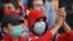 Armenia -- Fans wear medical masks during a soccer match in Yerevan on November 14, 2009.