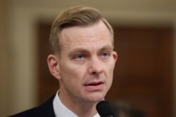 David Holmes, a political counselor at the U.S Embassy in Kyiv, testifies to a House Intelligence Committee hearing in Washington on November 21.