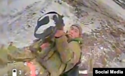 A frame grab from a first-person-view drone purportedly showing a North Korean soldier in Russia’s Kursk region in 2025.