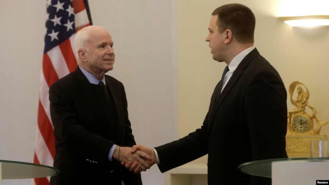 U.S. Senator John McCain shakes hands with Estonia's Prime Minister Juri Ratas in Tallinn, Estonia, on December 27. 