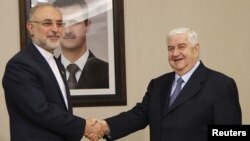 Алӣ Акбар Солеҳӣ ва Валид ал-Муаллим