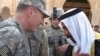 U.S. commander General David Petraeus (left) with Sheikh Abd al-Sattar Abu Rishah, who was killed by