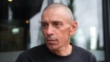 Ihar Karnei in Lithuania in June 2025 following the US-brokered release of 14 prisoners of Belarusian strongman Aleksandr Lukashenko's government. 