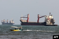 Vessels are seen in the Strait of Hormuz, off the port city of Bandar Abbas in southern Iran on August 10