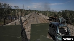 ویرانه‌های برجای مانده از حملات ارتش روسیه به ایالت لوهانتسک در شرق اوکراین