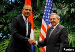Барак Обама и Рауль Кастро