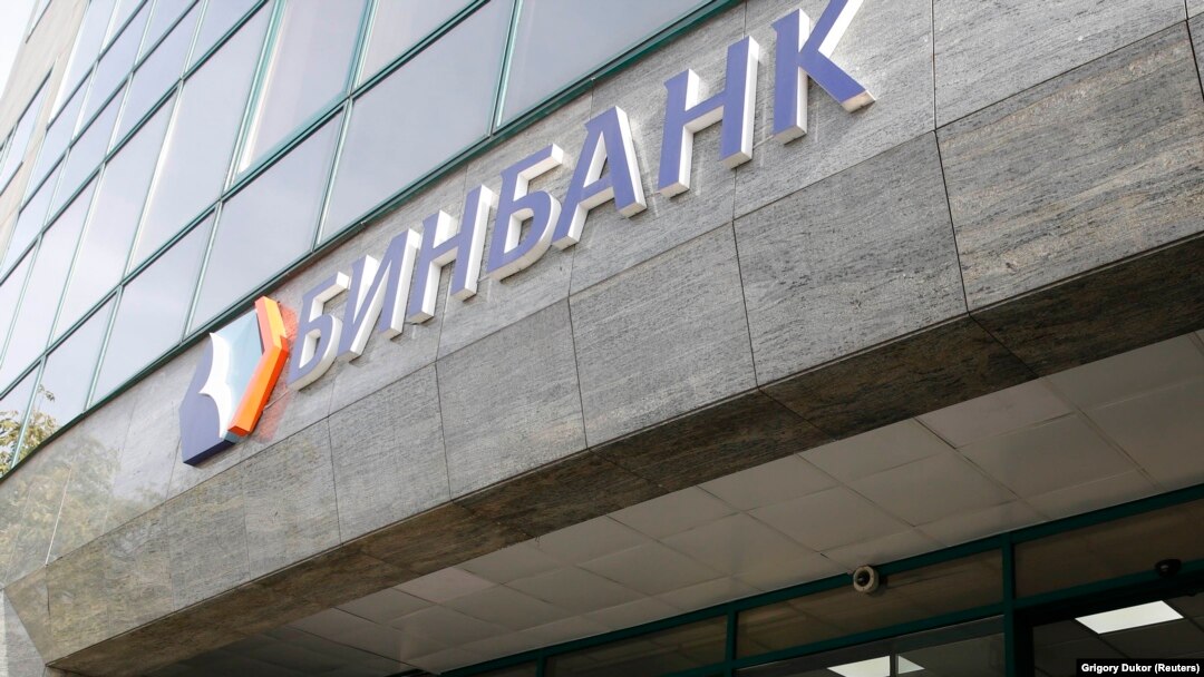 A man walks out of Russia's B&N Bank headquarters in central Moscow on September 20.