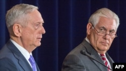 U.S. Secretary of Defense Jim Mattis (left) and U.S. Secretary of State Rex Tillerson in Washington on June 21.