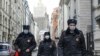 Russian police officers wearing face masks to protect against the coronavirus patrol an almost empty Arbat Street in Moscow amid a citywide lockdown on April 2. 