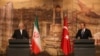 Глава МИД Ирана Мохаммад Джавад Зариф со своим турецким коллегой Мевлютом Чавушоглу