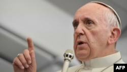Pope Francis also says he envisions a greater role for women in the 1.2 billion-member church.